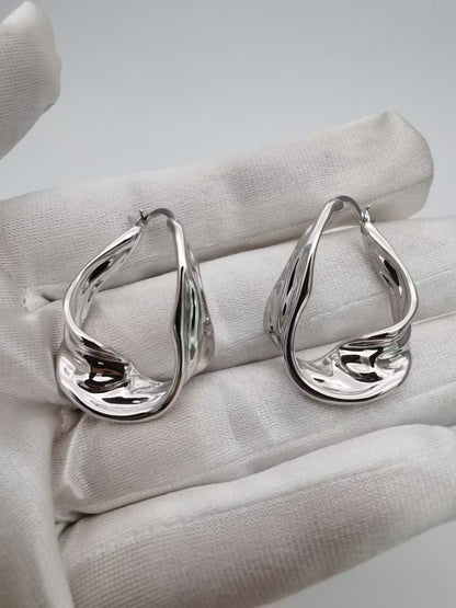 Boucles d'oreilles irrégulières en argent et en or