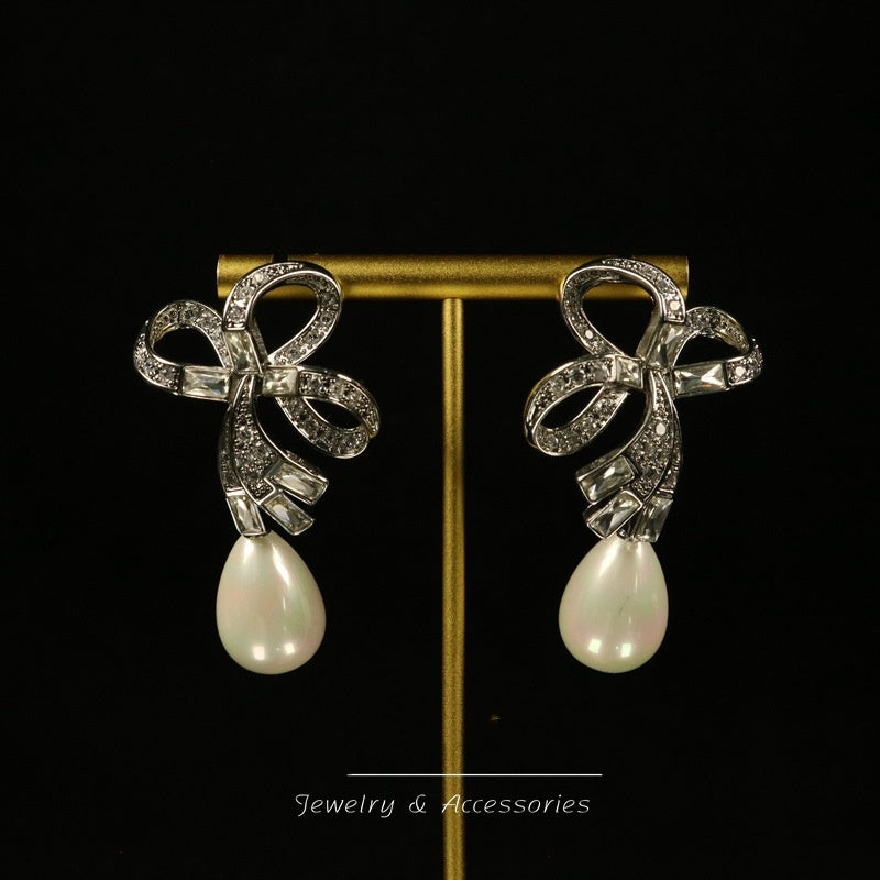 Diamond-Embellished Teardrop Shell Bow Drop Earrings