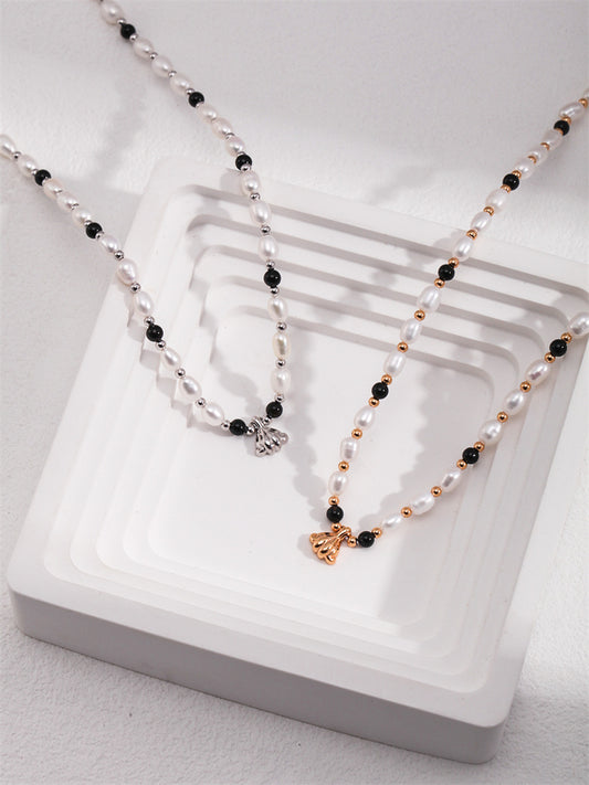 Elegant Necklace with Natural Pearls, Onyx, and Shell Pendant